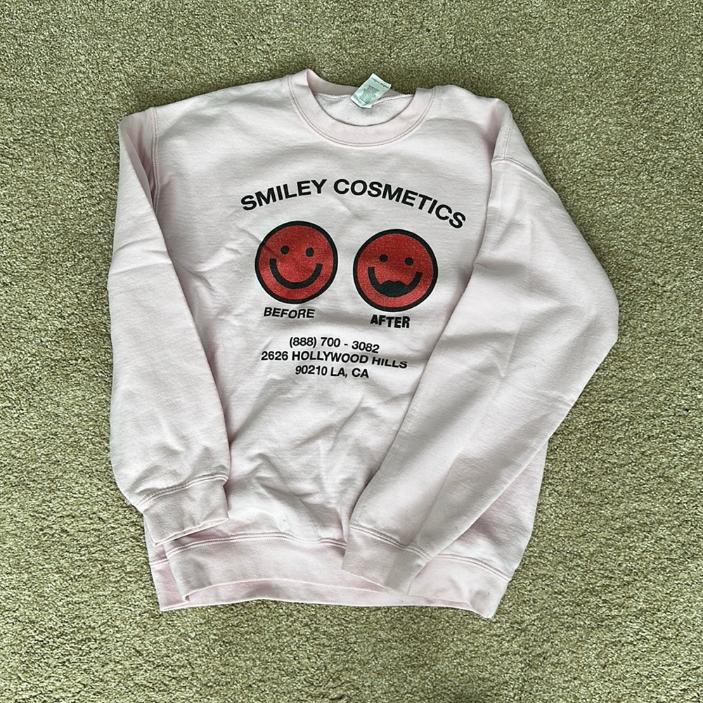 Urban sophistication smiley cosmetics crewneck